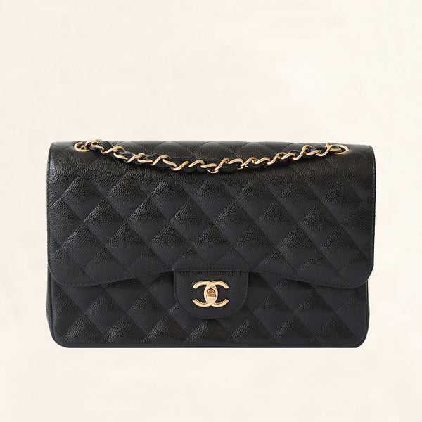 Chanel Black Quilted Caviar Medium Classic Double Flap Gold Hardware,  2009-2010 Available For Immediate Sale At Sotheby's