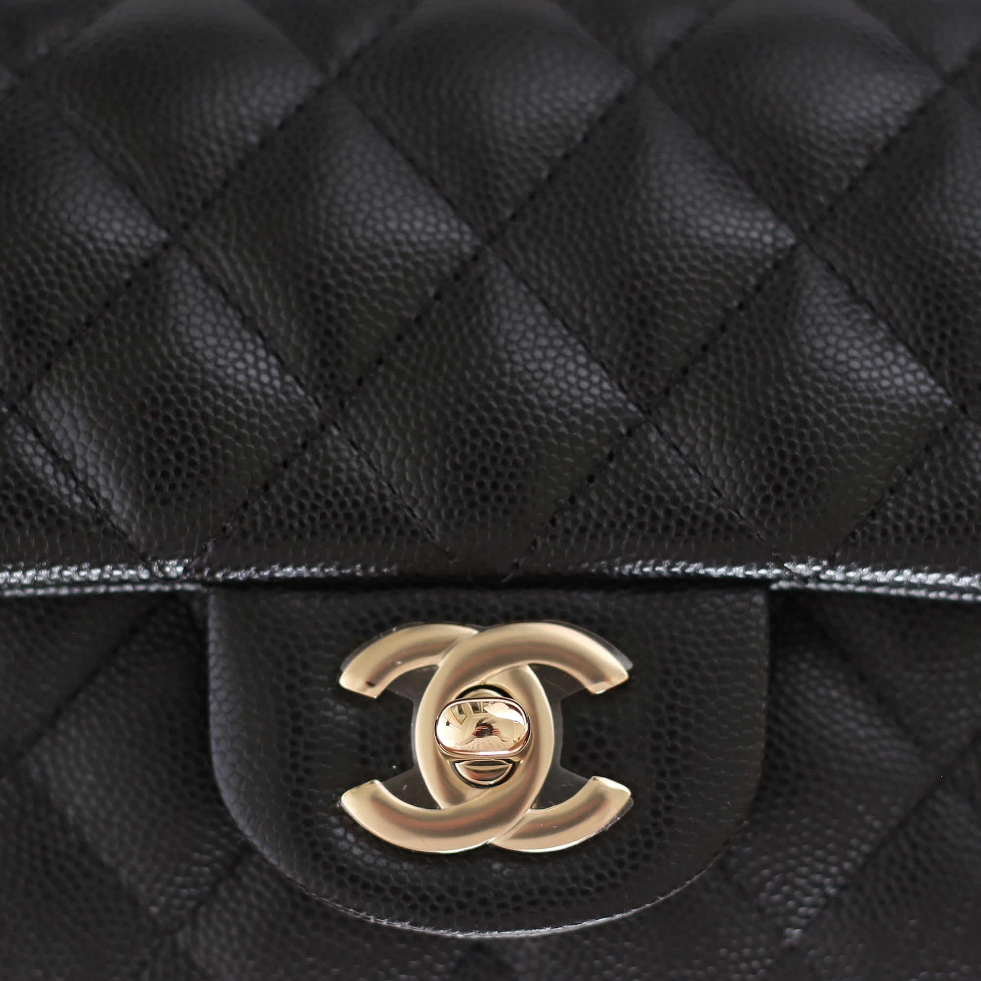 Chanel Quilted Clutch with Chain Black Caviar Silver Hardware