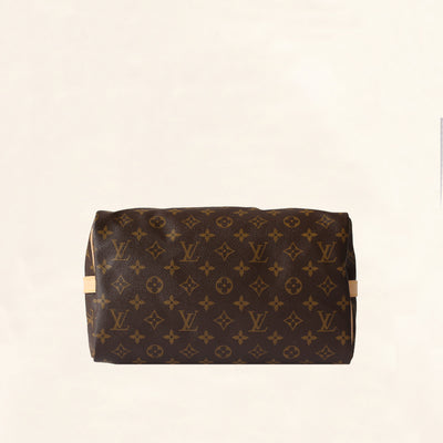 Louis Vuitton World Tour Speedy 30 - Monogram Leather Type: Monogram Canvas  Hardware: gold tone Condition: 9.5 Comes With: strap, lock…