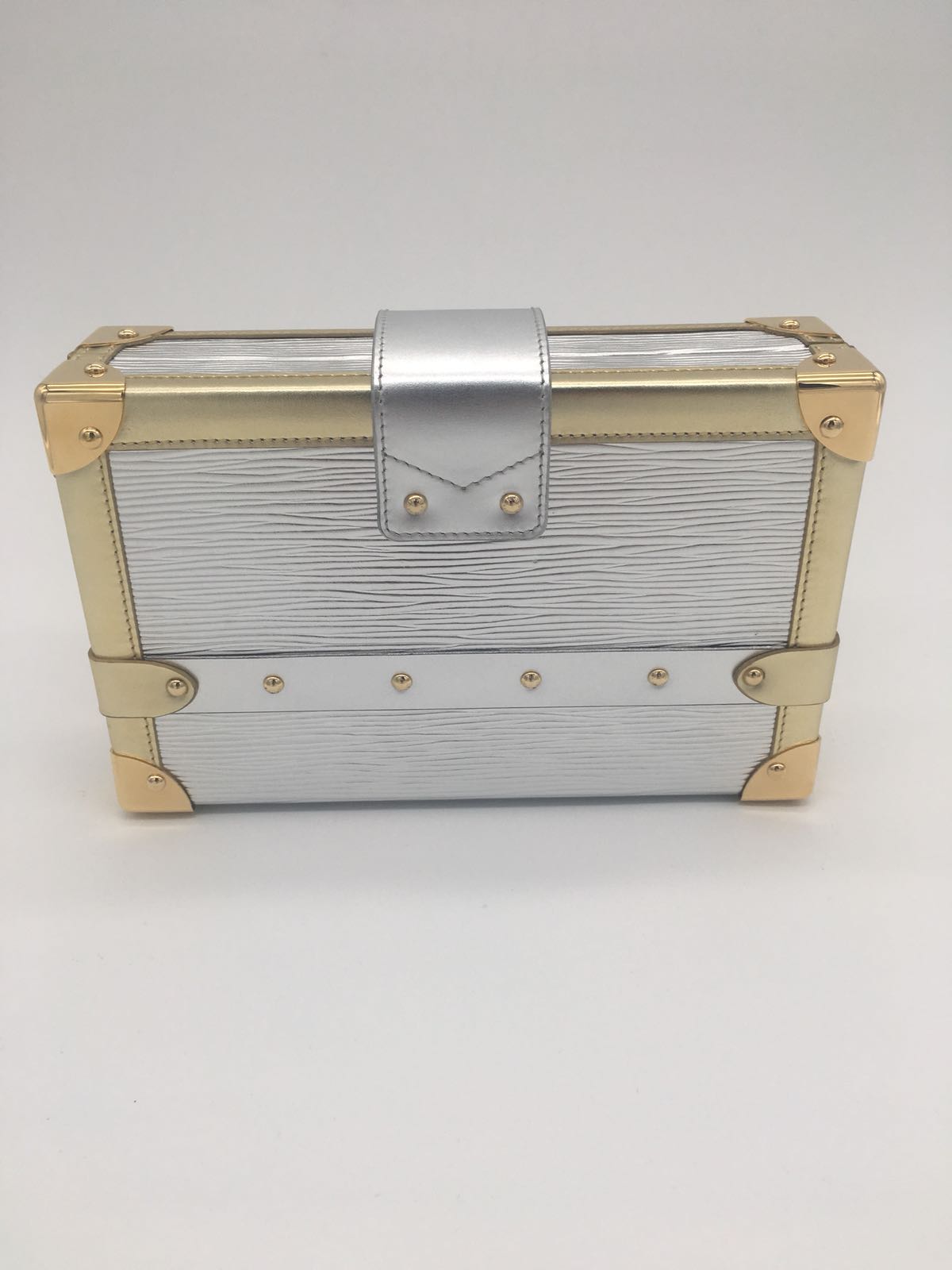 Sold at Auction: Louis Vuitton, A SOPHISTICATED LOUIS VUITTON TAURILLON PETITE  MALLE IN WHITE LEATHER WITH SILVER TONE HARDWARE LOUIS VUITTON, 2019