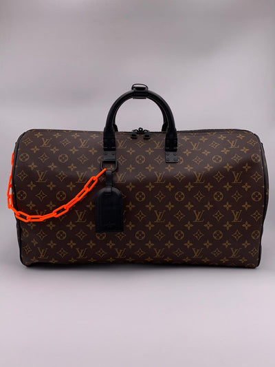 Louis Vuitton Keepall Bandouliere 50 with matted black and orange