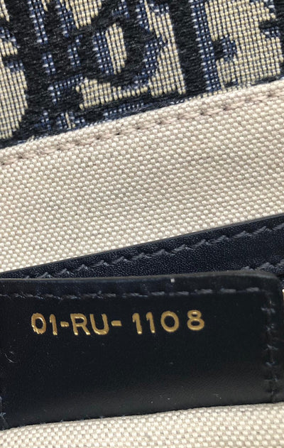 Dior saddle bag serial number sale