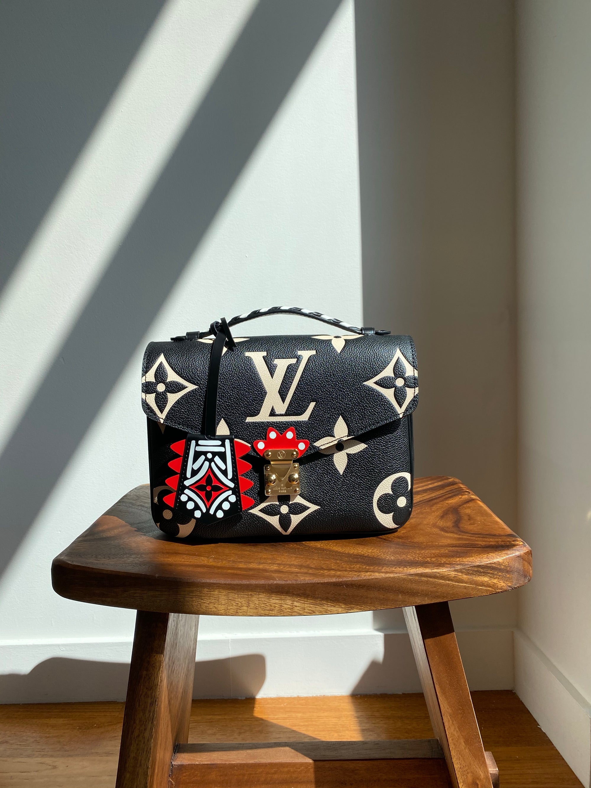 Louis Vuitton Crafty Pochette Metis Black in Embossed Grained Cowhide  Leather with Gold-tone - US