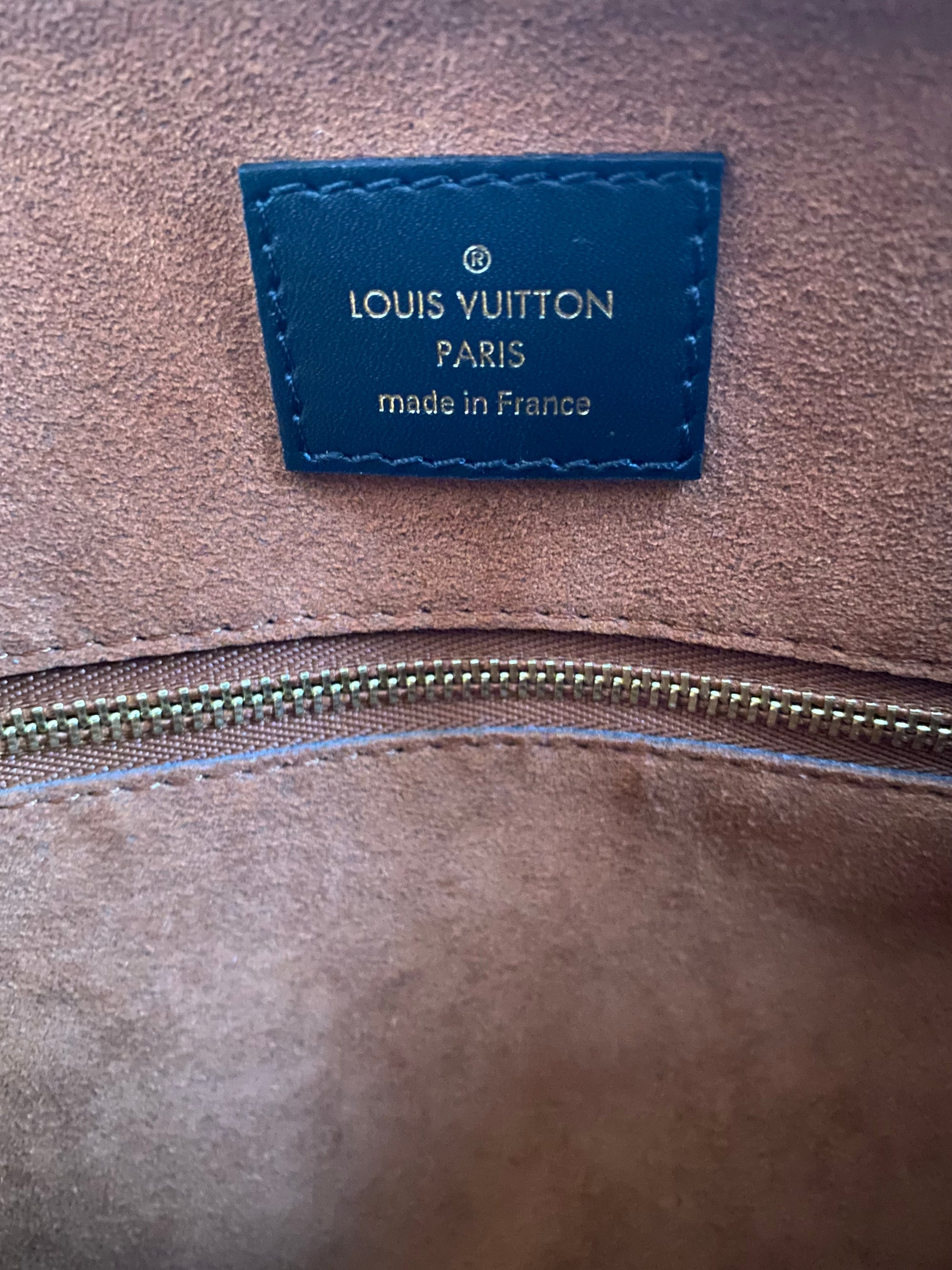 Normandy cloth handbag Louis Vuitton Brown in Cloth  32901165