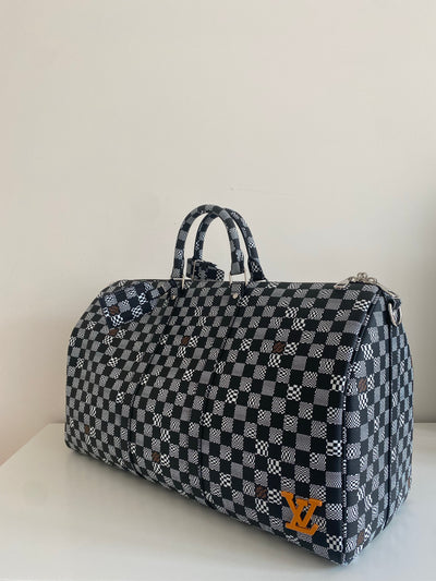 Louis Vuitton - Keepall Bandoulière 50 Mesh – Every Watch Has a Story